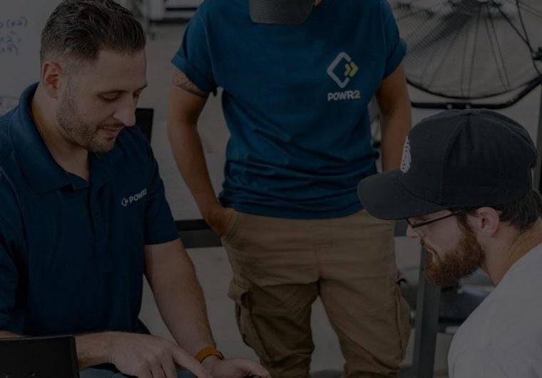 Powr2-background A background image for POWR2 of repair workers on the job