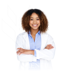 Jeneil-lifestyle A woman in a lab coat smiles in Jeneil's lifestyle image