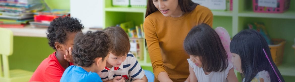 savvas-background-3 Children with their teacher learning in class
